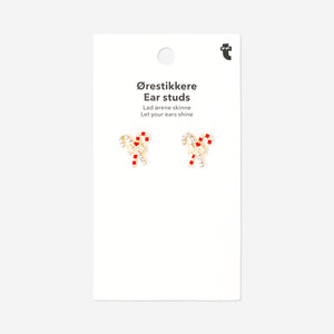 Textile stud earrings featuring Christmas candy cane and bow designs from Flying Tiger Copenhagen, festive holiday jewelry accessory.