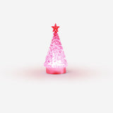 Color-changing glowing tree gadget by Flying Tiger Copenhagen with vibrant, shifting lights and a decorative, illuminated tree design.