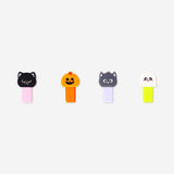 Set of four Halloween-themed highlighters by Flying Tiger Copenhagen featuring spooky designs for office or school use.