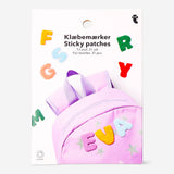 Set of 31 colorful sticky letter patches for textiles from Flying Tiger Copenhagen, suitable for craft and hobby projects.