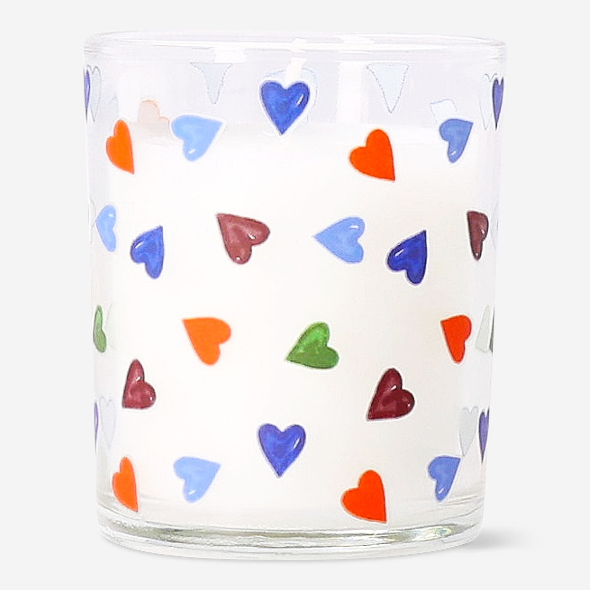 Scented candle from Flying Tiger Copenhagen with cypress and cedarwood fragrance, displayed in a glass jar on a cozy home setting