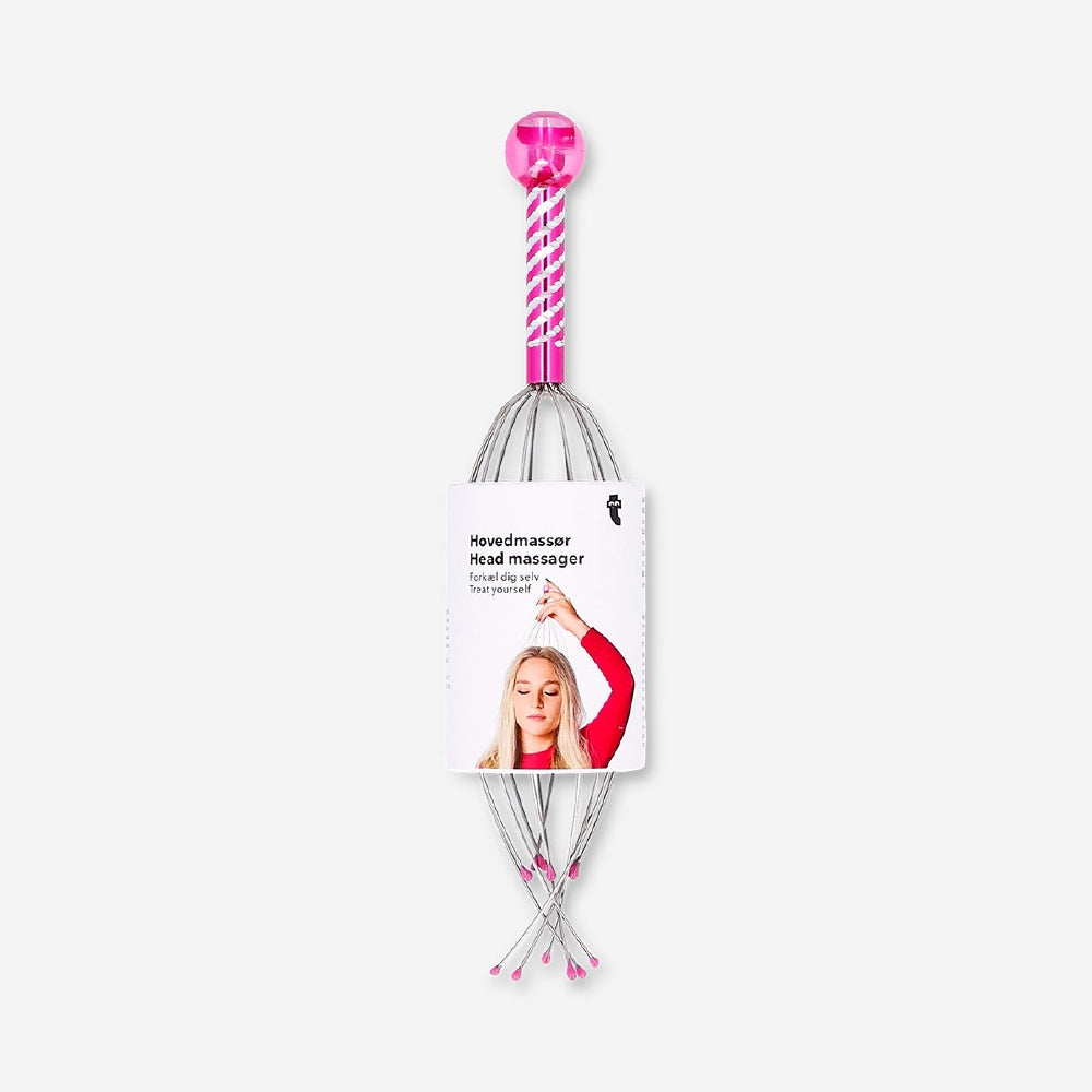 Pink Flying Tiger Copenhagen head massager gadget with multiple flexible prongs for scalp relaxation and soothing massage.