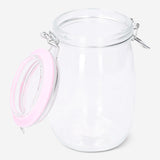 Glass jar with blue rim, 22 cm tall, suitable for kitchen storage, by Flying Tiger Copenhagen, shown on a clean countertop.