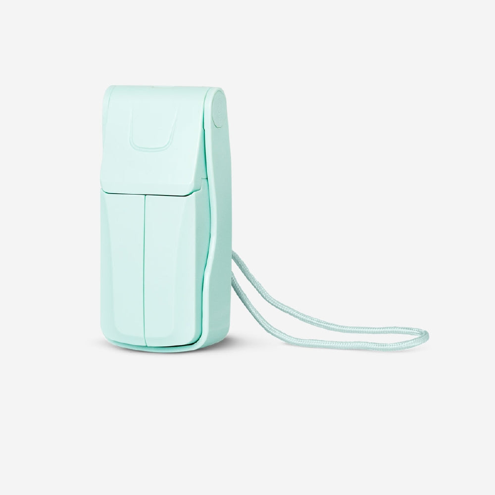 Flyer Tiger Copenhagen 2-in-1 foldable fan with three speed settings in mint color, compact gadget for cooling and portability.