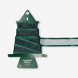 Green organza ribbon from Flying Tiger Copenhagen, 3 meters long, shown spread out on a white background for office craft projects.