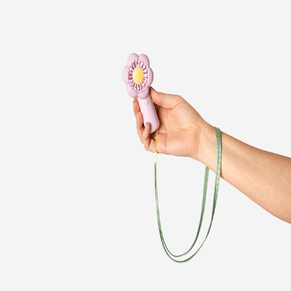 Flying Tiger Copenhagen handheld flower fan with strap, compact gadget for cooling and style, featuring a colorful flower design.