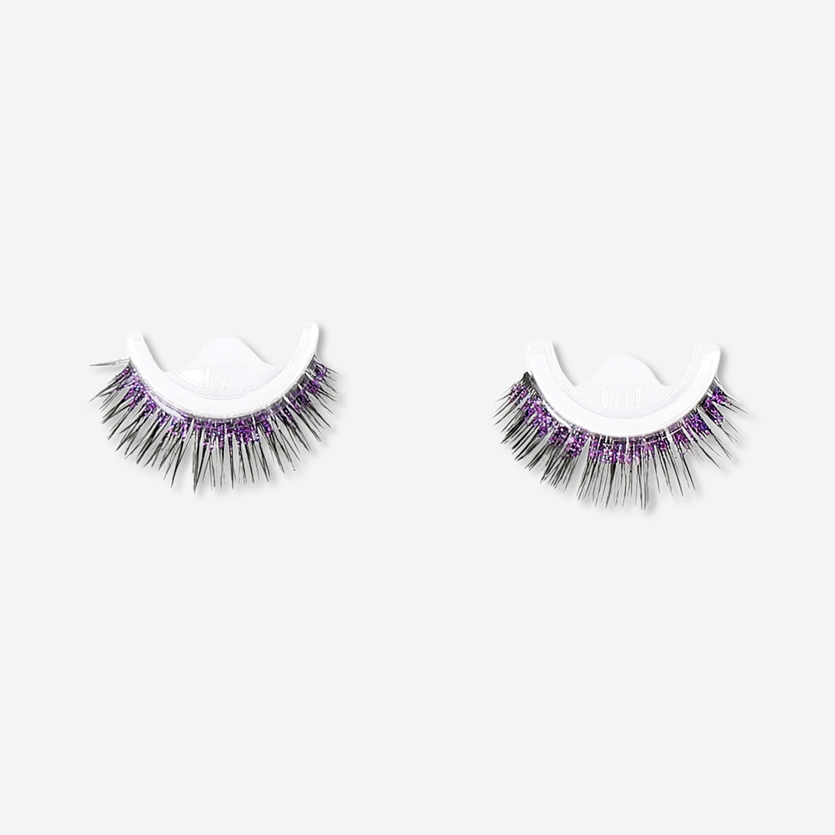 Purple adhesive eyelashes from Flying Tiger Copenhagen, lightweight false lashes with adhesive for personal care use.