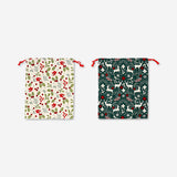 Two Christmas print drawstring gift bags for office use by Flying Tiger Copenhagen, featuring festive holiday designs.