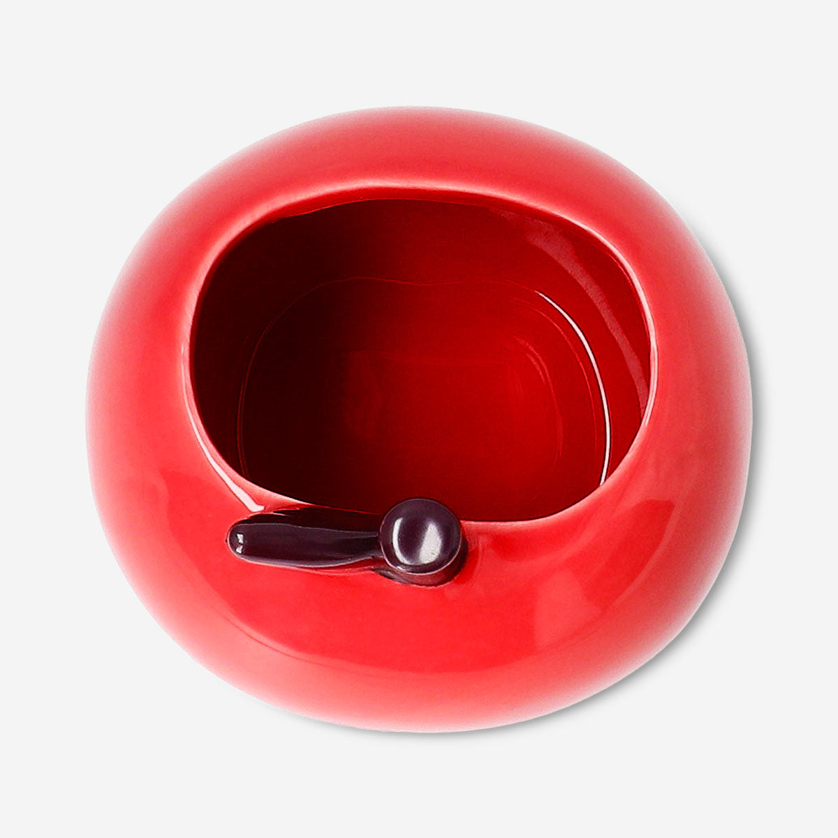 Red ceramic apple-shaped pencil holder for office use, by Flying Tiger Copenhagen, with a glossy finish and realistic apple details.