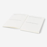 Flying Tiger Copenhagen write-and-burn office journal with lined pages and hardcover, designed for note-taking and creative writing.