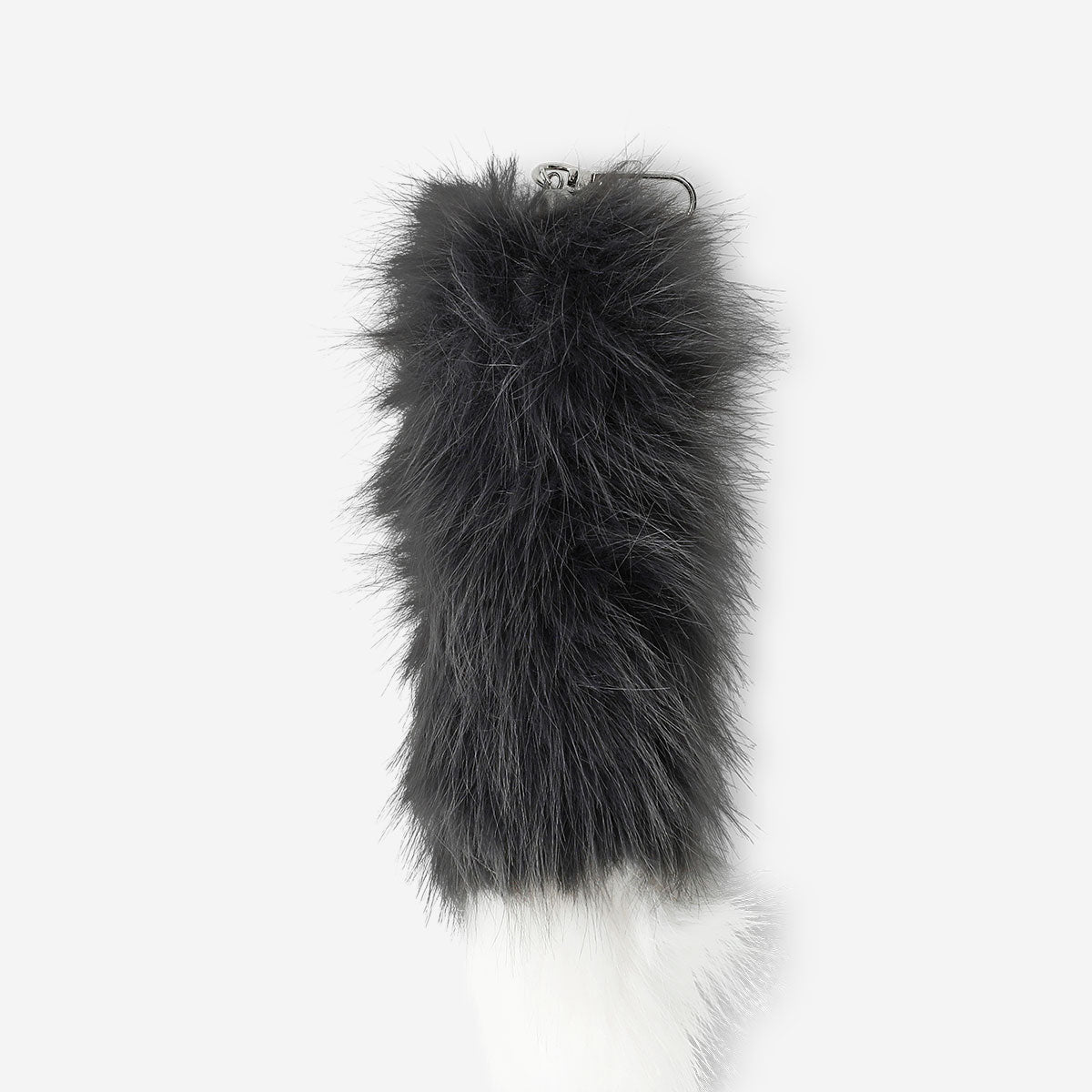 Textile foxtail keyring from Flying Tiger Copenhagen featuring a soft, colorful fox tail design on a keyring.