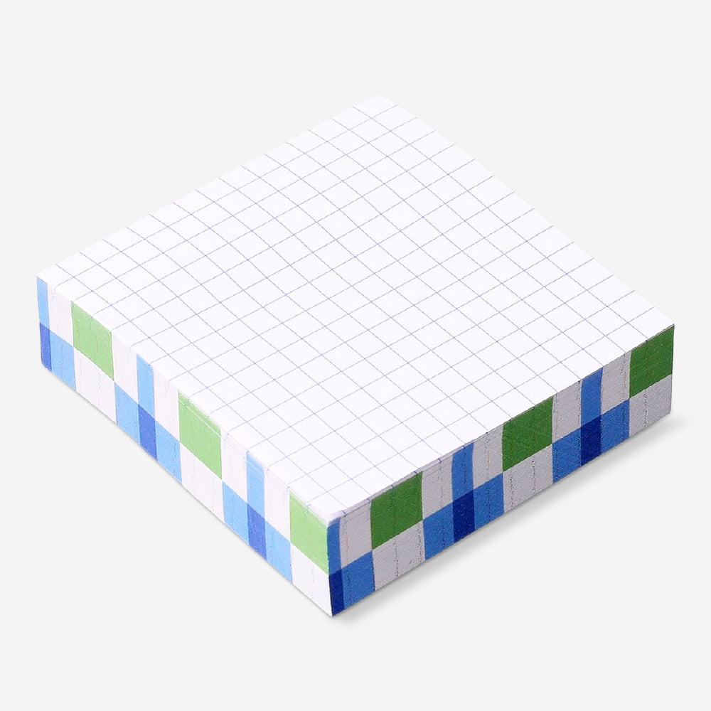 Flying Tiger Copenhagen sticky memos with grid pattern for office notes and organization.