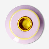 Candle holder with embossed flowers