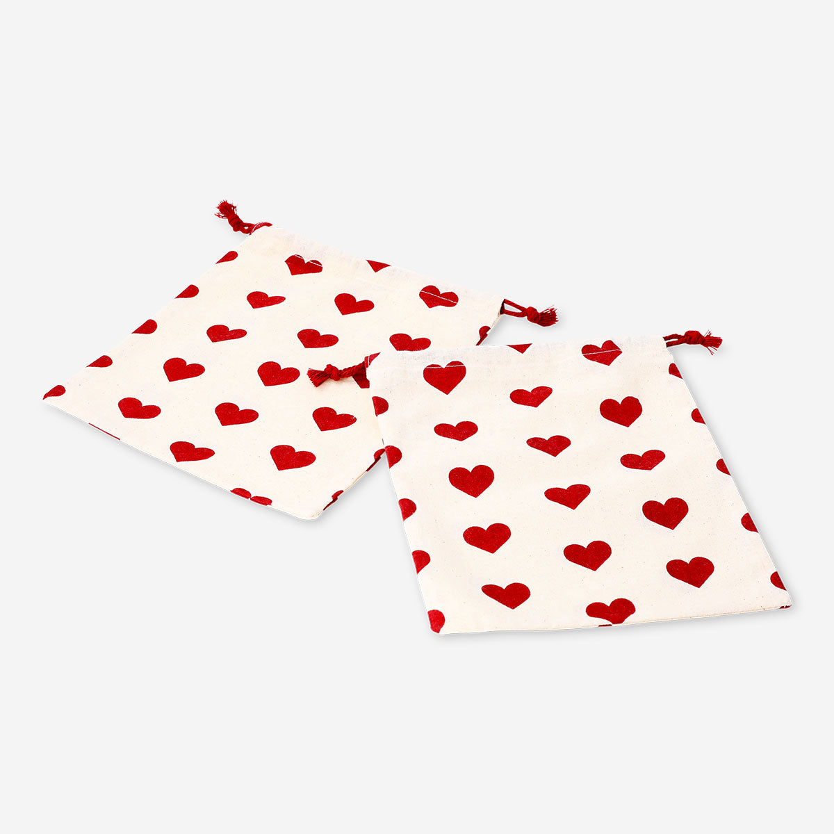 Two heart print drawstring gift bags for office use, featuring Flying Tiger Copenhagen branding and convenient drawstring closure.