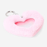 Textile keyring with a heart-shaped picture frame featuring a playful design, by Flying Tiger Copenhagen.
