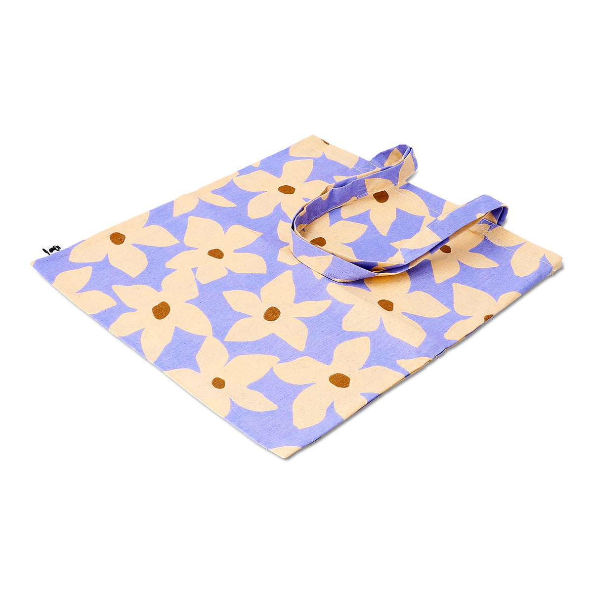 Textile tote bag with colorful flower print from Flying Tiger Copenhagen, featuring sturdy handles and a spacious interior.