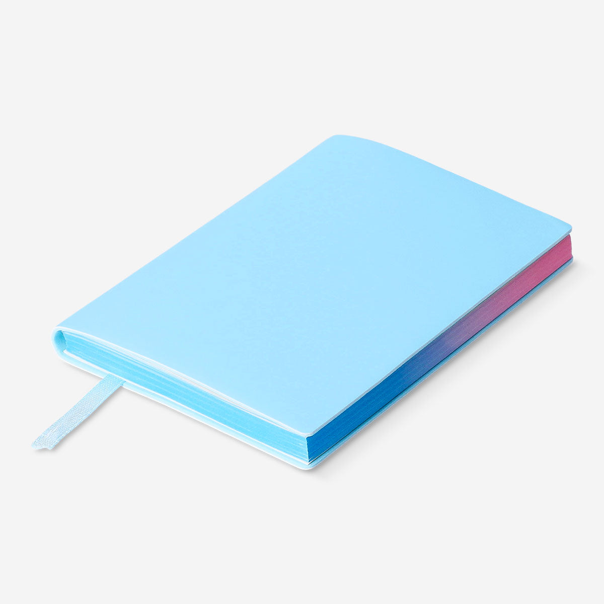 A6 office notebook by Flying Tiger Copenhagen with colorful rainbow edge and lined pages for note-taking and organization.