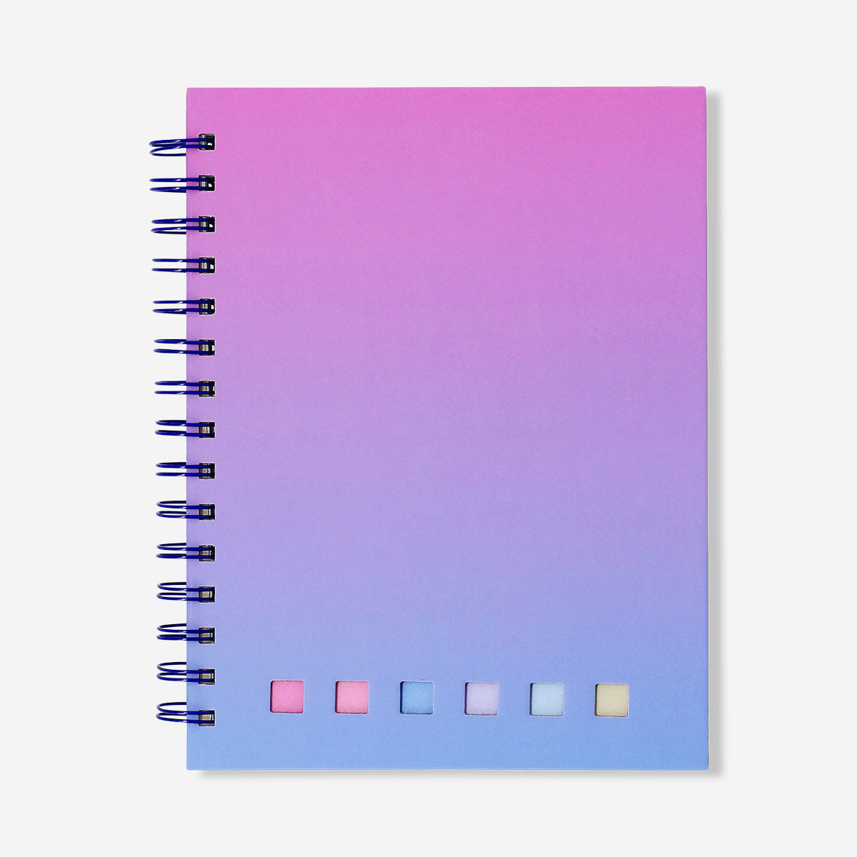 Gradient office notebook with Flying Tiger Copenhagen ballpoint pen and colorful page markers on a desk.
