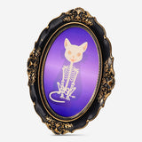 Haunted picture in an oval frame, 34 cm, by Flying Tiger Copenhagen, featuring spooky, atmospheric artwork in a vintage-style display.