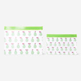 Two reusable kitchen grip seal bags with green pear design by Flying Tiger Copenhagen for storing food.