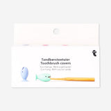 Set of four Flying Tiger Copenhagen fish-shaped toothbrush covers with suction pads, perfect for bathroom organization.