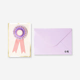 Flying Tiger Copenhagen birthday card with festive rosette design, perfect for celebrating special occasions in an office setting.