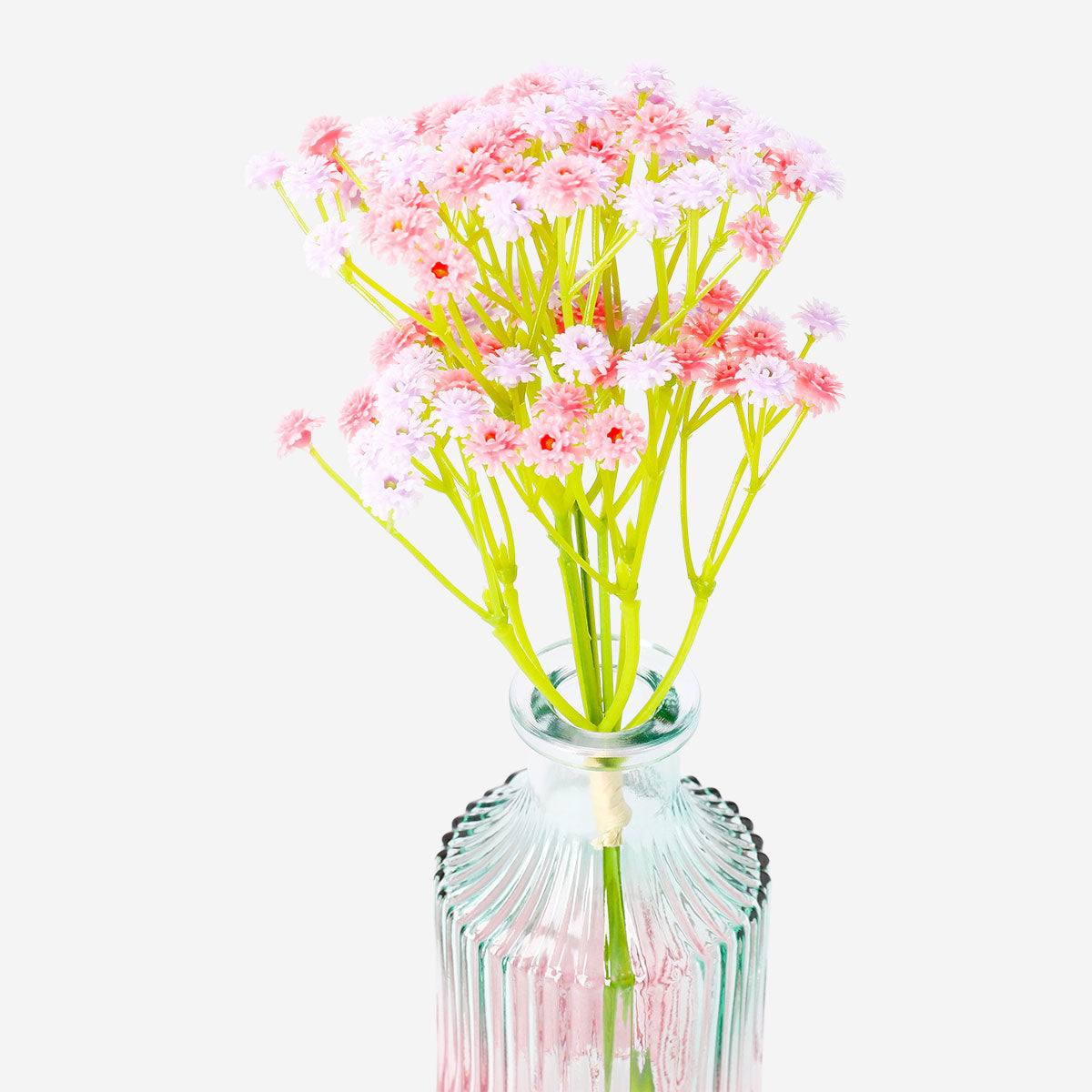 Decorative pink and lilac flower bouquet for home decor by Flying Tiger Copenhagen, featuring vibrant floral arrangement.
