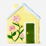 Decorative yellow ceramic house, 13 cm tall, ideal for home decor, by Flying Tiger Copenhagen.