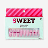 Pink cherries press-on nails from Flying Tiger Copenhagen, featuring a colorful cherry design for personal care and nail fashion.