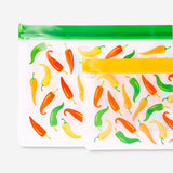 Two reusable kitchen grip seal bags with chilli print from Flying Tiger Copenhagen, ideal for food storage and freshness.
