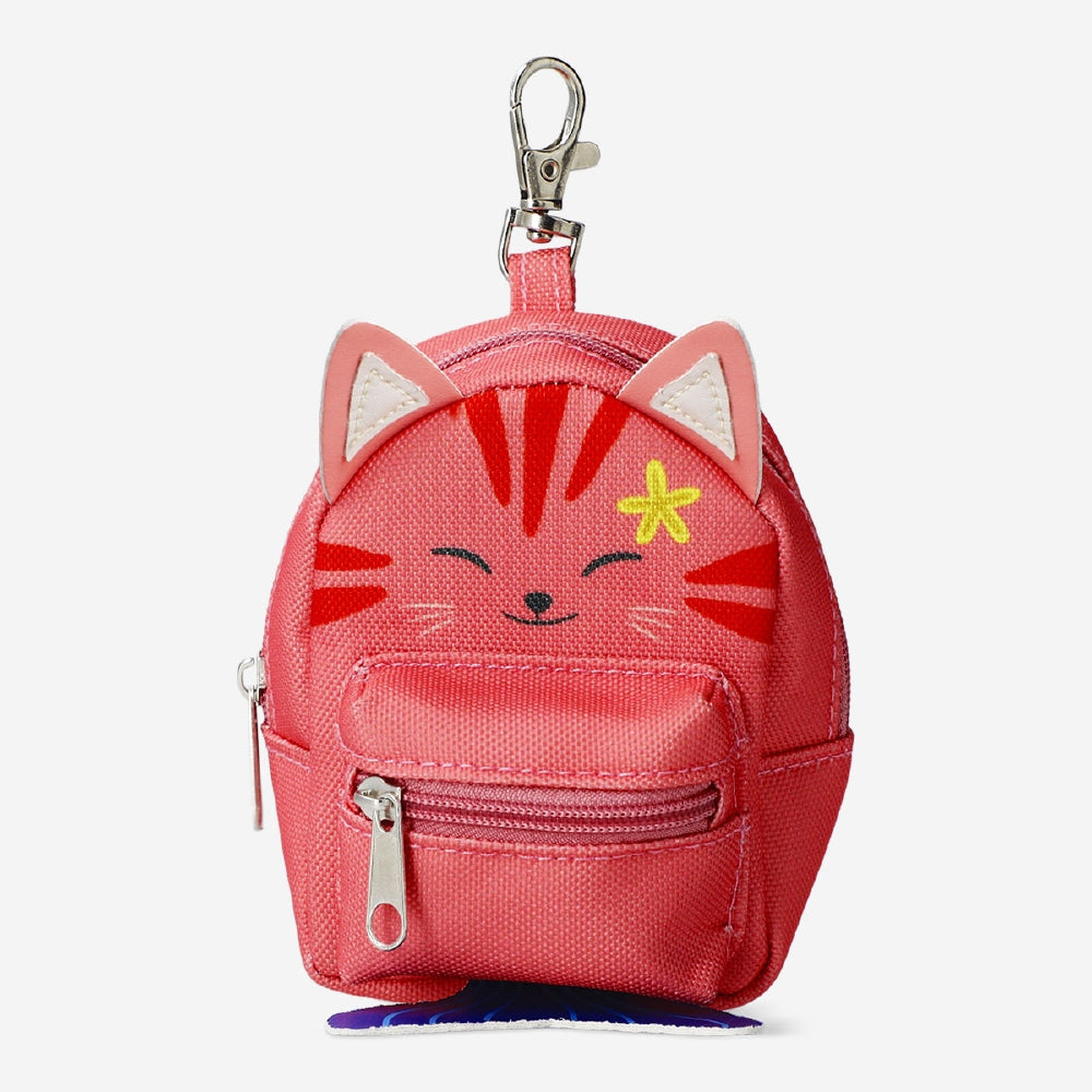 Colorful stationery kit with cat backpack design by Flying Tiger Copenhagen, perfect for organizing office supplies.