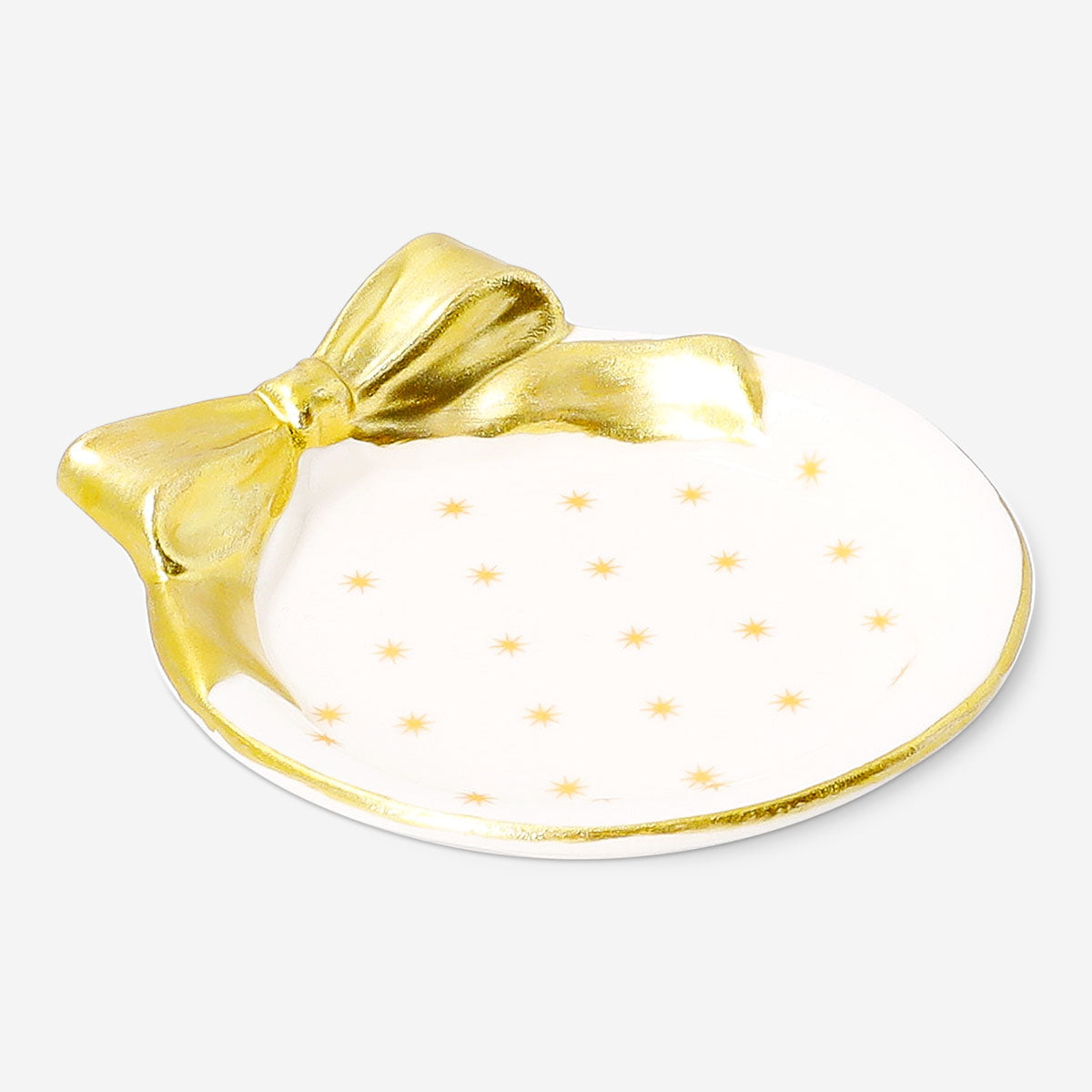 Small 9 cm ceramic dish with gold bow detail, ideal for home decor, by Flying Tiger Copenhagen.