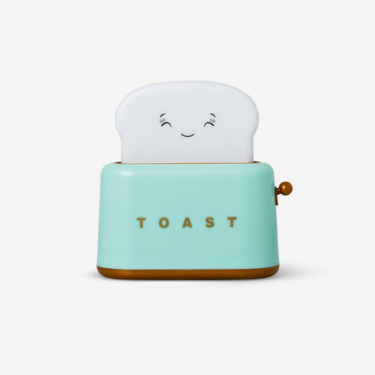 Colour changing lamp as a toaster with bread