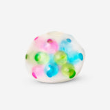 Flying Tiger Copenhagen Press Me Toy fidget ball gadget with colorful, squeezable design for stress relief and sensory play.