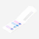 Small floral page markers from Flying Tiger Copenhagen, colorful office accessories with flower designs for marking pages.