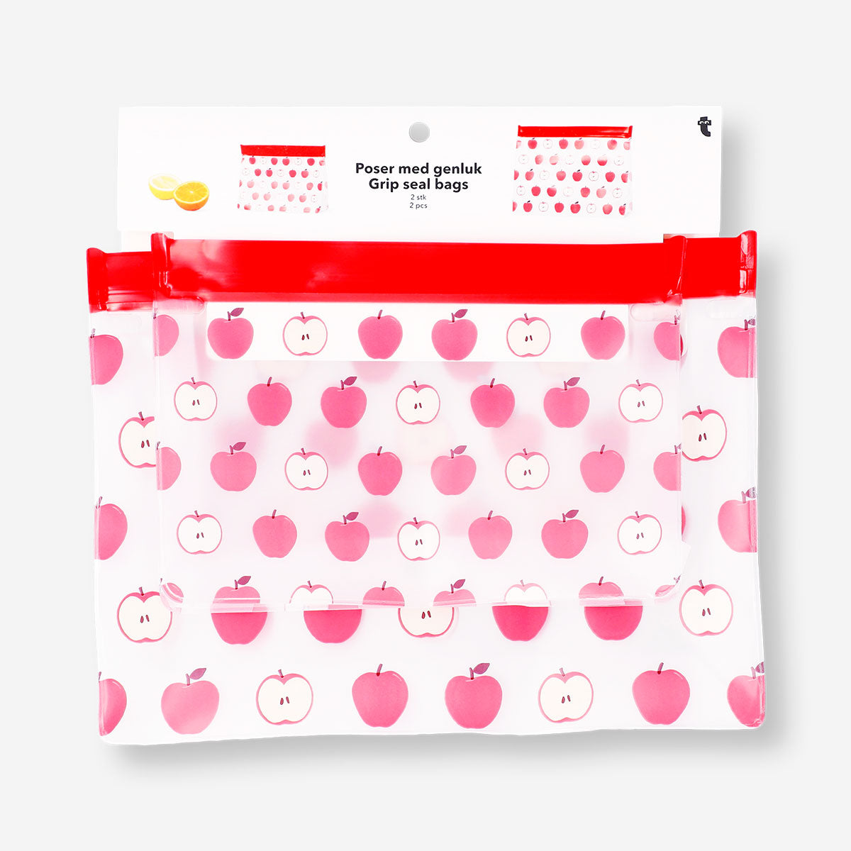 Two reusable kitchen grip seal bags with red apple pattern by Flying Tiger Copenhagen, perfect for food storage.