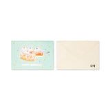 Flying Tiger Copenhagen birthday card with a pop-up slice of cake, featuring colorful and detailed office-themed design.