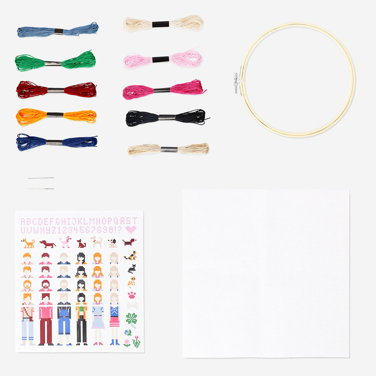 Embroidery kit with friendship motifs and stencils from Flying Tiger Copenhagen, featuring colorful embroidery patterns and tools.