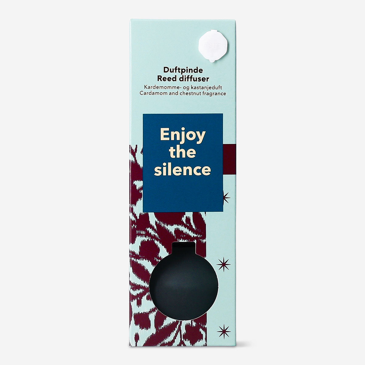 Flying Tiger Copenhagen reed diffuser featuring cardamom and chestnut scent, with elegant glass bottle and natural reed sticks.