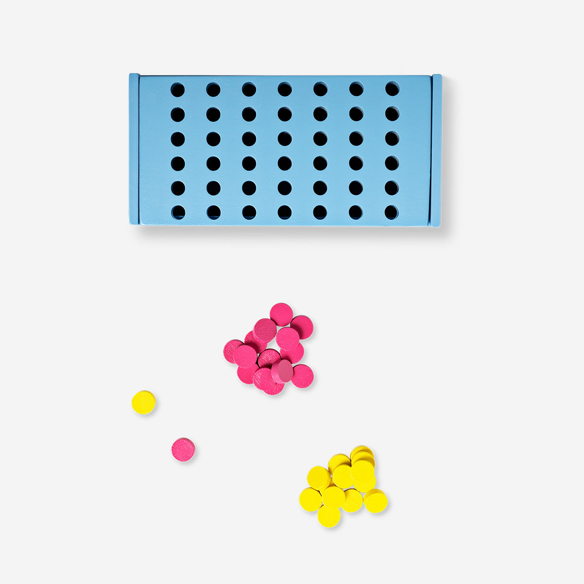 Flying Tiger Copenhagen 4-in-a-row game with colorful plastic pieces on a wooden game board.