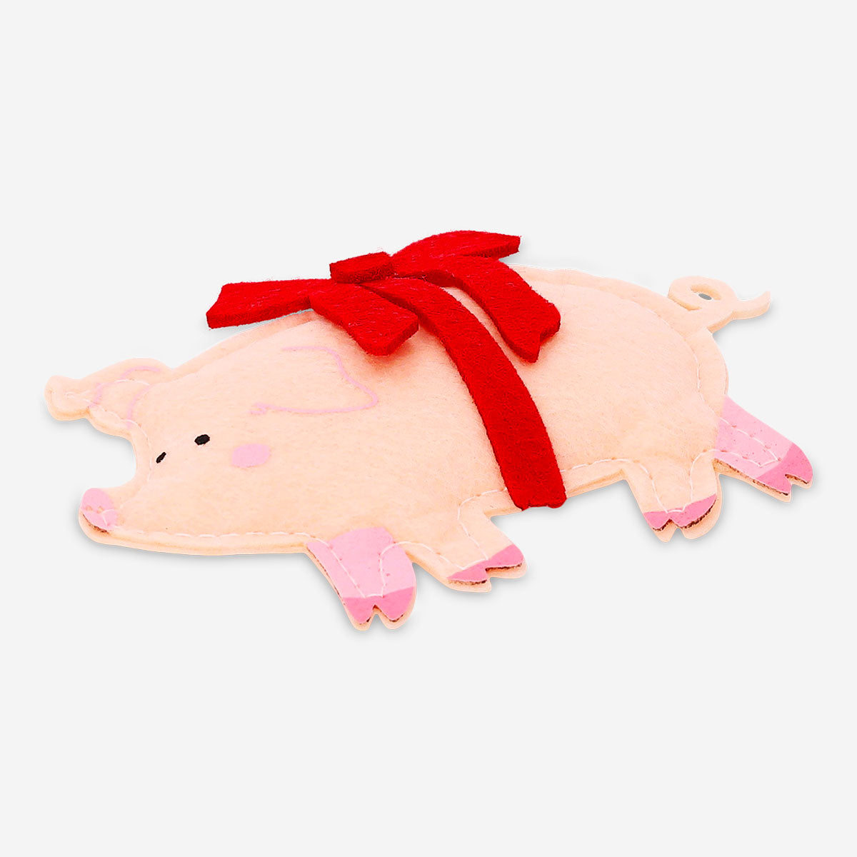 Felt hanging ornament of a pig with ribbon, decorative home decor by Flying Tiger Copenhagen.