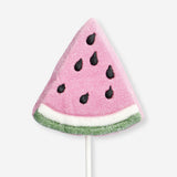 Watermelon-flavored marshmallow on a stick, branded Flying Tiger Copenhagen, with vibrant pink and green colors.