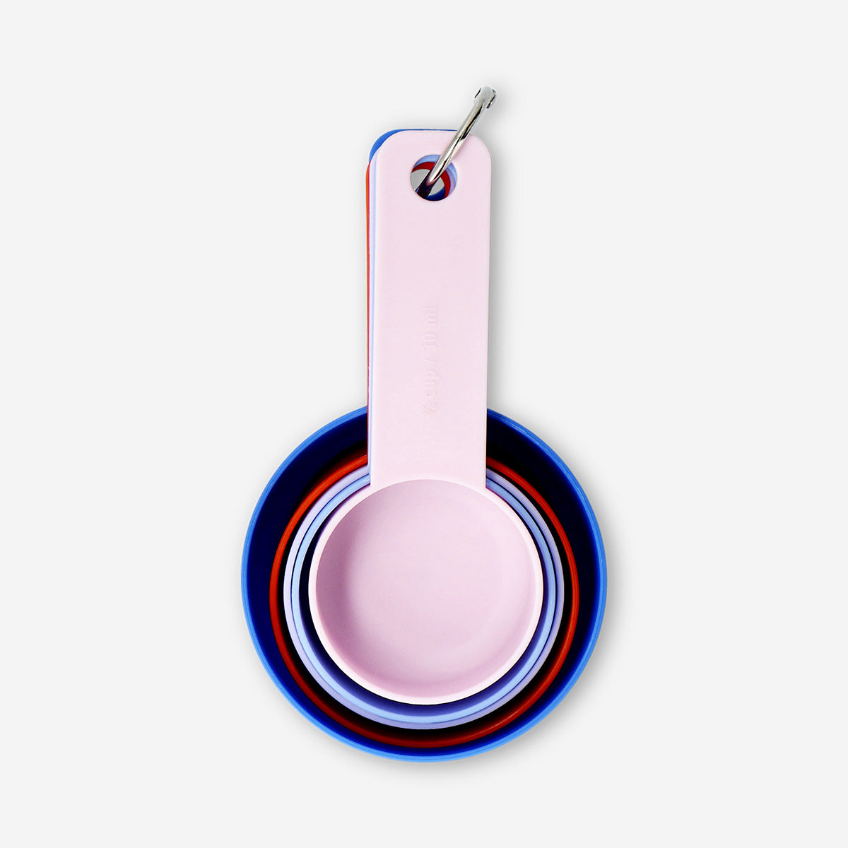 Set of four Flying Tiger Copenhagen designer kitchen measuring cups for accurate cooking and baking measurements.