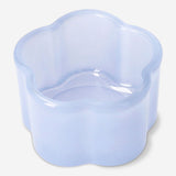 Milky blue glass tealight holder for home decor, with a smooth round shape and translucent finish from Flying Tiger Copenhagen.