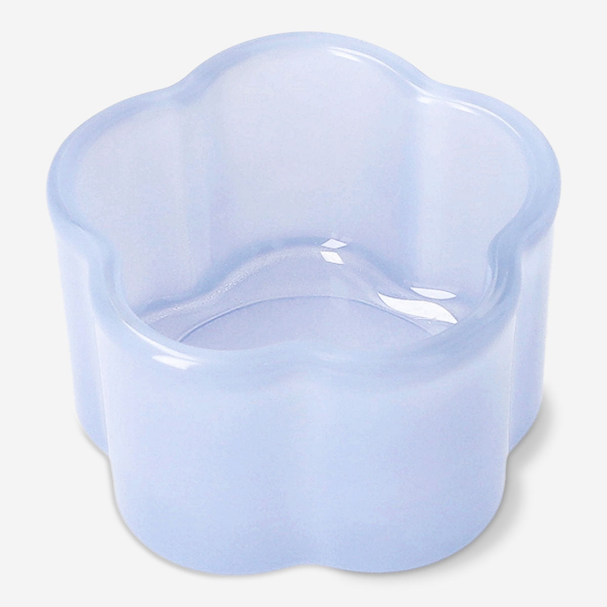 Milky blue glass tealight holder for home decor, with a smooth round shape and translucent finish from Flying Tiger Copenhagen.