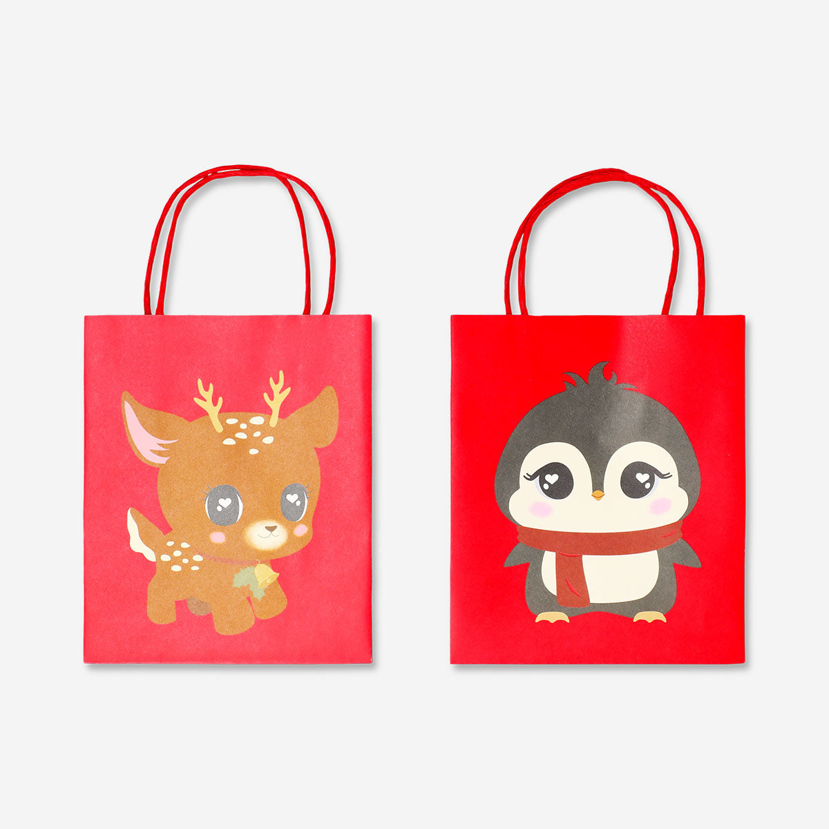Two cute Christmas character gift bags from Flying Tiger Copenhagen, designed for office gift wrapping, featuring festive holiday illustrations.