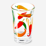 40ml shot glass with chili print by Flying Tiger Copenhagen, featuring a colorful chili design on clear glass.