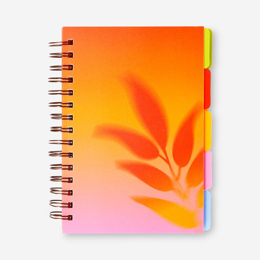 A5 leaf notebook with page markers from Flying Tiger Copenhagen, showing a colorful cover and open pages with markers.