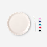 Decorative 20 cm DIY hobby plate by Flying Tiger Copenhagen, showcasing a colorful, creative design on a ceramic surface.