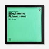 Black wood picture frame measuring 20x20 cm, designed for home decor, by Flying Tiger Copenhagen, shown with a photo inside.